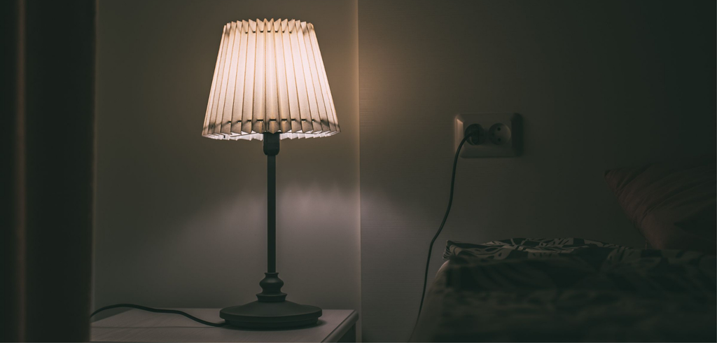 Comment bien positionner sa lampe de chevet pour un éclairage optimal ?